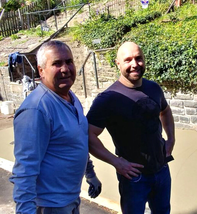 Marcello and his father at a fresh concrete pour in Philadelphia
