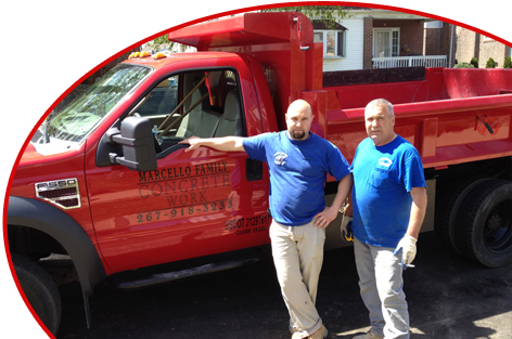 The Marcello family father and son outside their concrete contractor truck