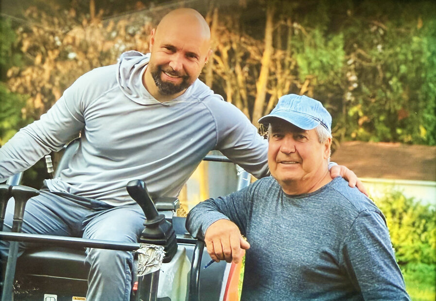 Marcello and his father in front of the company truck in Northeast Philadelphia