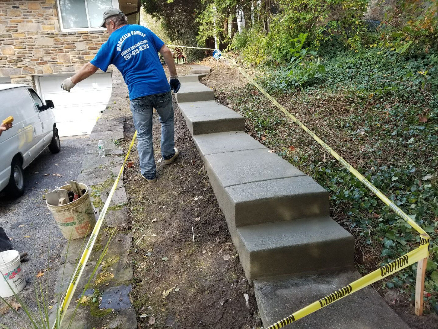 Concrete walkway and step replacement on a Northeast Philadelphia row home by Marcello Family Cement Work