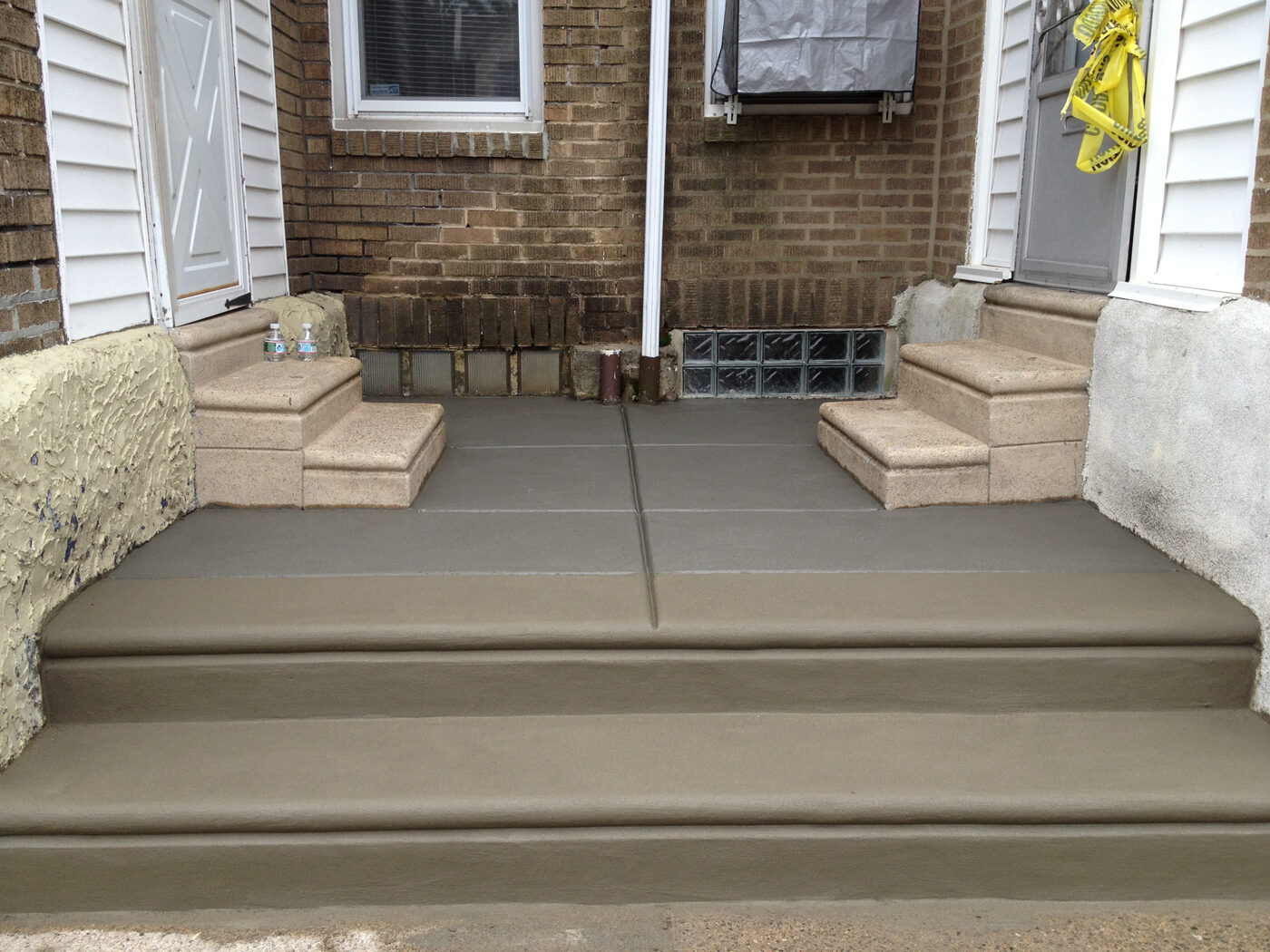 Concrete steps and entrance landing on a Philadelphia row home