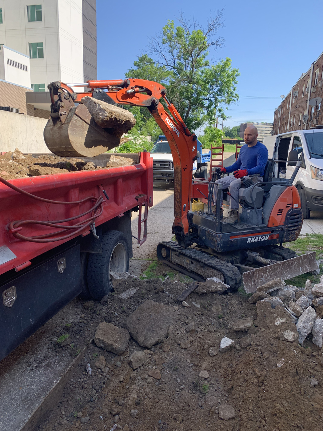 Concrete driveway tear-out in Northeast Philadelphia, demolition phase before fresh pour.