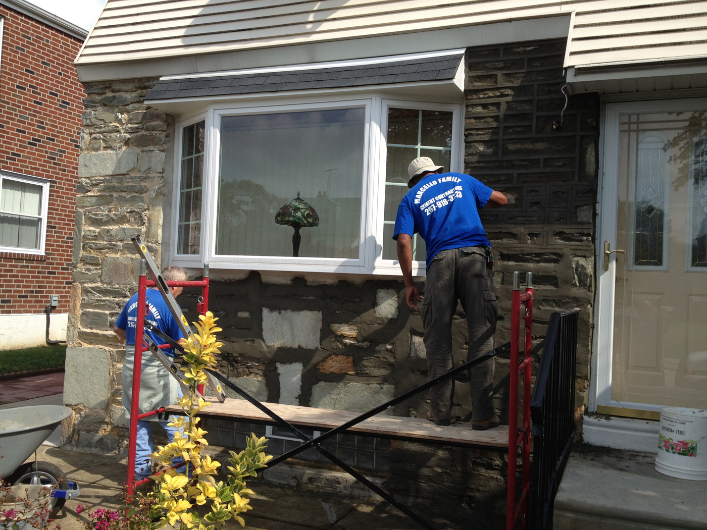 Stone wall mid-repointing with packed mortar joints in Northeast Philadelphia