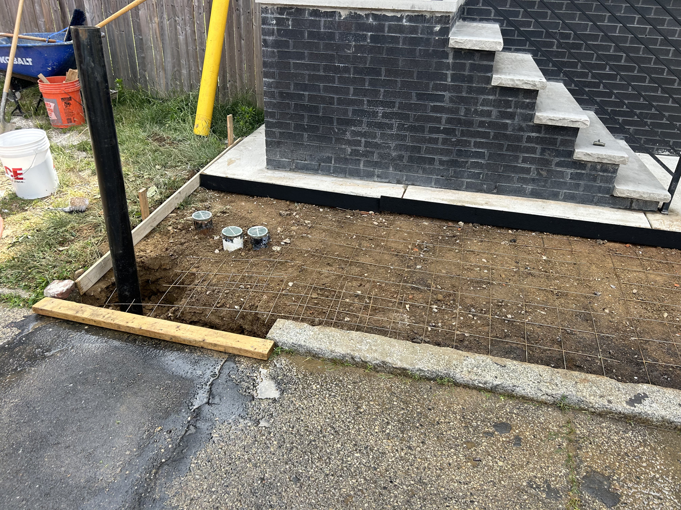 Sidewalk project &mdash; Old slabs out. &mdash; Philadelphia by Marcello Family Cement Work