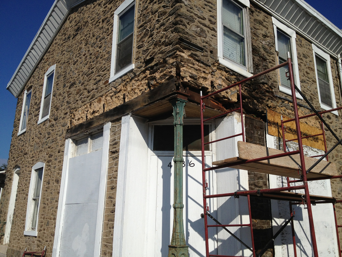 Stone wall mid-repair in Philadelphia by Marcello Family Cement Work